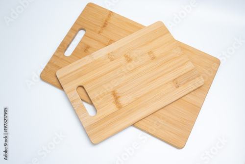Two Bamboo Cutting Boards with Handles on White