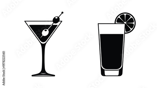 Two cocktail glasses with citrus garnish a striking silhouette