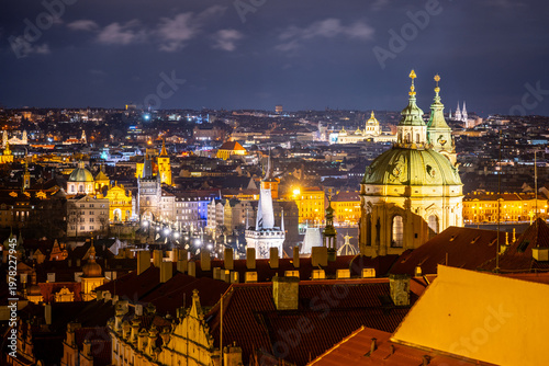 Tablou pe pânză View of St Nicholas Church and Charles Bridge at night in Prague
