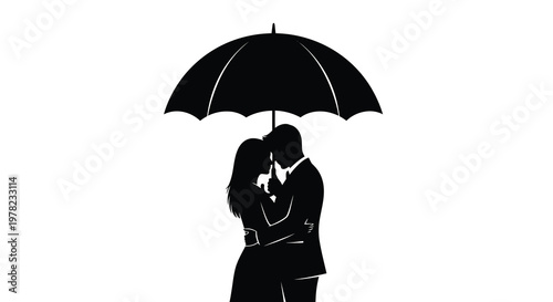 Silhouetted couple sharing a romantic kiss under an umbrella