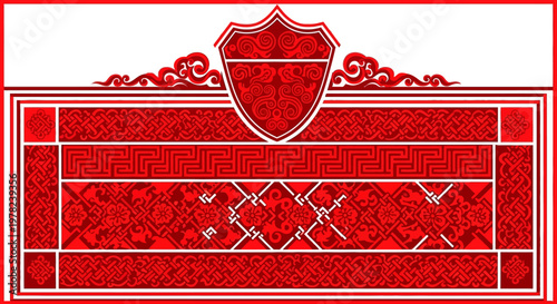Red ornate shield emblem with decorative patterns.