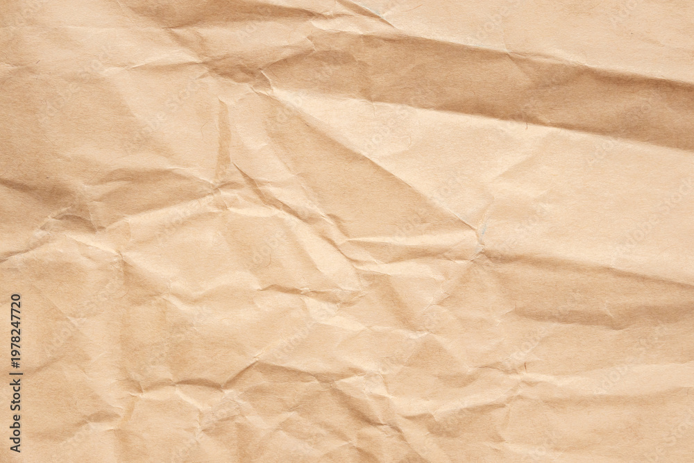 Fototapeta premium Abstract crumpled and creased recycle brown paper texture background