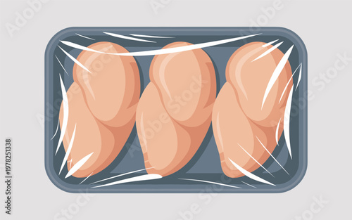 A packaged tray of sausages wrapped in plastic on a gray background