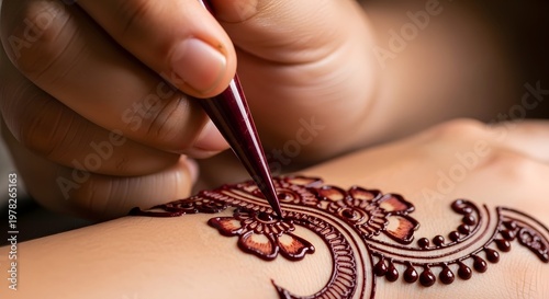 the process of painting mehndi on hands using henna leaf paste, made by Ai