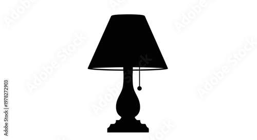A stark black lamp against white a dramatic silhouette