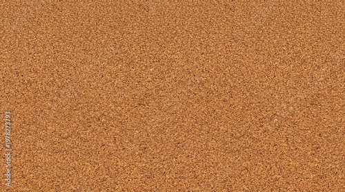 Detailed cork board background with rough textured surface and uniform brown color