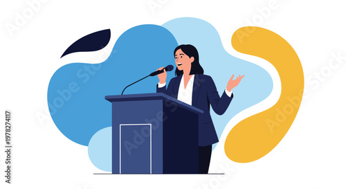 Professional woman in a business suit giving a motivational speech at a blue podium with a microphone in a lecture hall.
