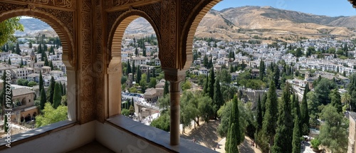 Three arches open up to a view of mountains and a city, showcasing architectural features with golden details and white walls