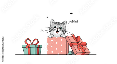 Adorable grey tabby kitten popping out of a pink polka dot gift box with a meow message for a birthday surprise.