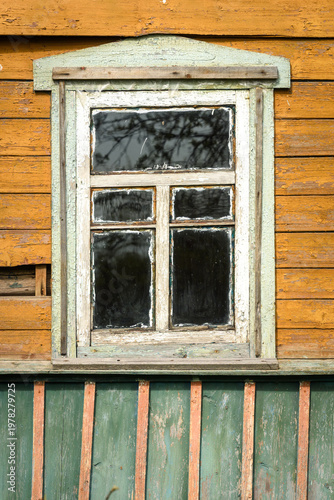 Old Wooden Window With Peeling Paint In Traditional Rural House
