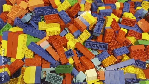 Colorful plastic building bricks pile