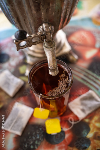 Traditional Russian Samovar And Glass Of Tea With Empty Yellow Tea Bag Tags For Copy Space