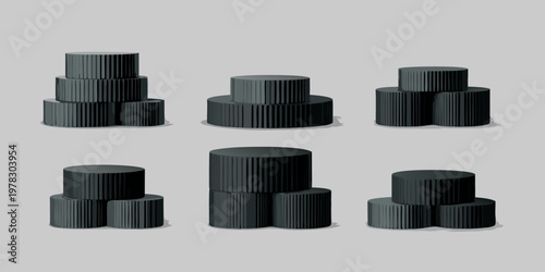 Abstract arrangement of black cylindrical forms with ribbed textures
