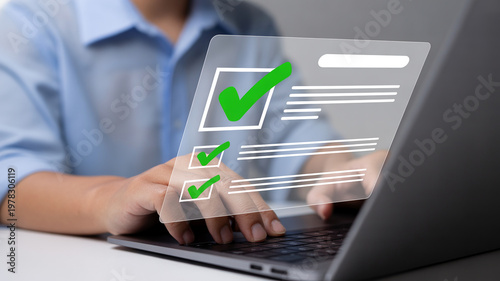 A person completes a digital checklist on a virtual screen while typing on a laptop keyboard