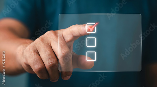 Digital checklist in hand for business project management and futuristic task completion concept.