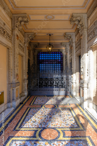 Old residential building along Corso Sempione in Milan, Italy. Entryway