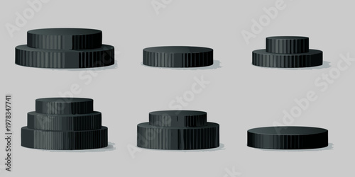 Black plastic knobs and dials arranged in a studio setting