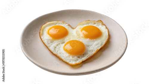 Three sunny-side up eggs in heart shape on a plate, isolated on transparent background