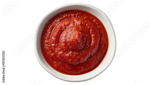 Fotografía Thick red tomato sauce swirl in white bowl, isolated on transparent background