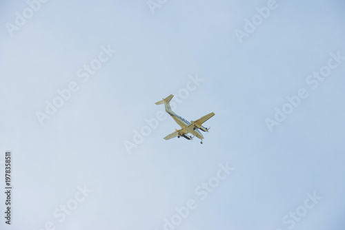 Wallpaper Mural Airplane flying in a blue sky in bright sunlight in springtime, Almere, Flevoland, The Netherlands, April 8, 2026 Torontodigital.ca