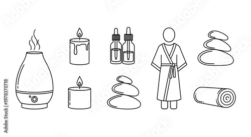 A person in a robe stands next to a humidifier, candles, and essential oils for relaxation.