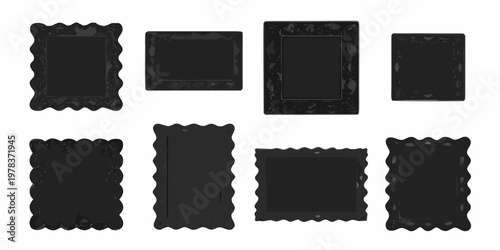 A collection of six black picture frames in various ornate designs