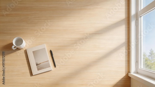 Wooden desk with cup book and pen