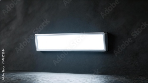 Rectangular light fixture on dark wall
