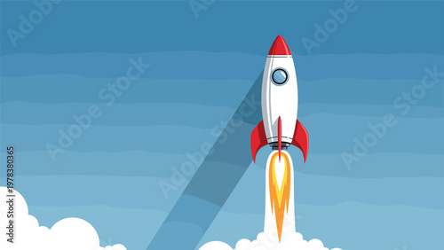 White space rocket with red fins launching into the blue sky leaving a bright orange trail of fire and smoke against white clouds.