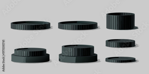 Arrangement of black plastic caps in various sizes and shapes