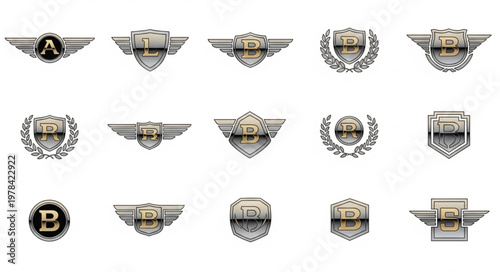 Collection of Metal Emblems and Badges with Letters and Wings.