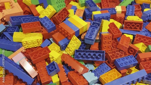Colorful pile of interlocking toy bricks