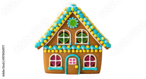 gingerbread house with colorful candy decorations on white background