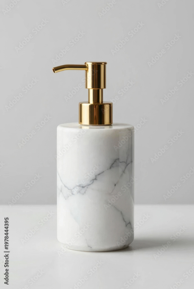 Obraz premium white marble soap dispenser with gold pump high end product shot