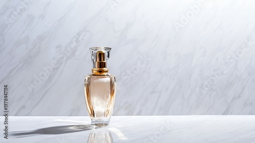 Luxury perfume bottle on white marble background with copy space