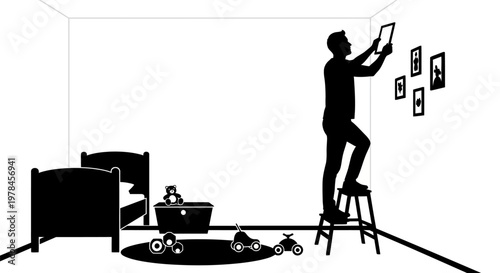 Man hanging picture on wall.