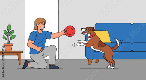 Man kneeling indoors playing frisbee with an excited dog wearing a yellow cape.
