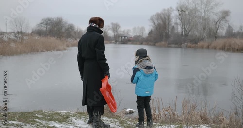 Man and kid boy go for walk. Dad and son play outside. 4K 10-bit