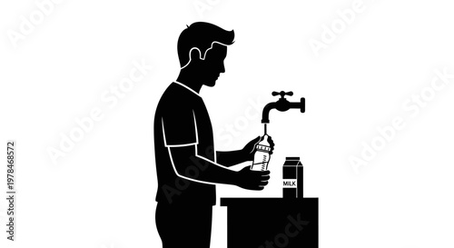 Man filling bottle at water fountain.