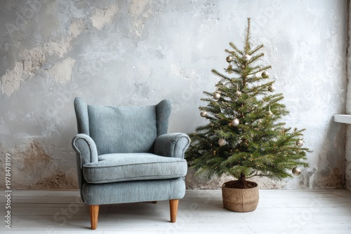 Cozy armchair and decorated evergreen tree in a rustic room.