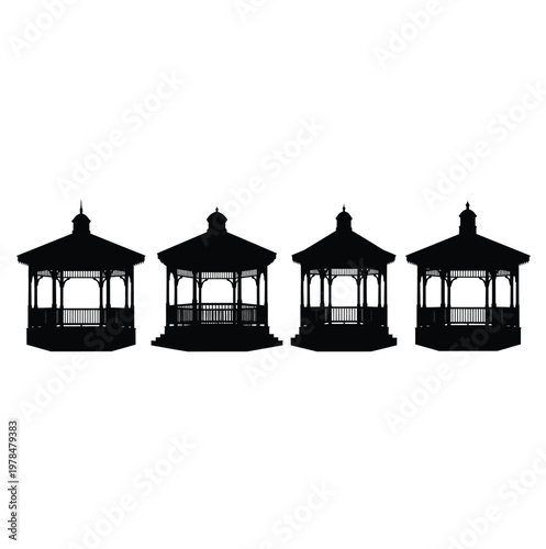 Four ornate gazebos stand in a row a striking black silhouette