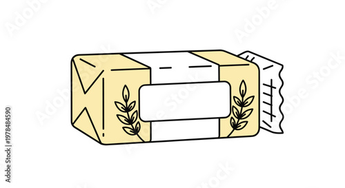 Illustration of a rectangular stick of butter wrapped in cream colored paper with golden wheat ear designs on the side.