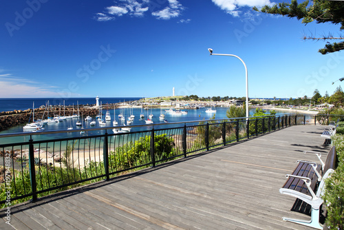 Bild auf Leinwand Idyllic, scenic view from a timber boardwalk lookout to the Illawarras famous dual lighthouses located on Flagstaff Hill and the Wollongong Harbour Breakwater, Belmore Basin, NSW Australia