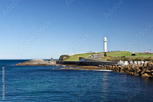Fotografia Wollongong Head Lighthouse (also known as Flagstaff Hill Lighthouse or Flagstaff Point Light), located on Flagstaff Hill, adjacent Wollongong Harbour, New South Wales, Australia