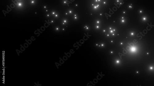 渦を巻いてゆっくりと落下するたくさんの白い粒子