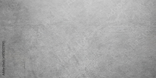 Rough grey paper texture with a blank grunge pattern and old cement wall surface design for a vintage canvas backdrop