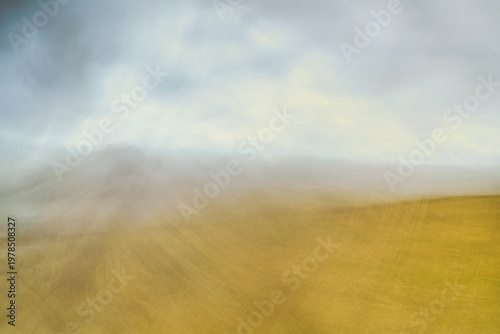 Misty twilight hues paint the desolate landscape with muted tones.