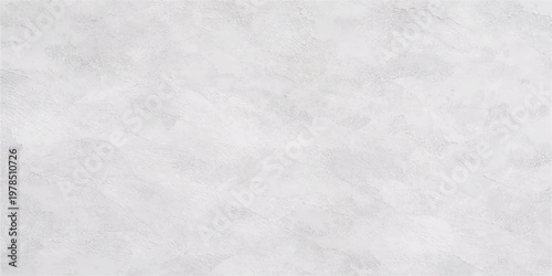 A closeup macro of a rough white marble surface with a cold winter snow texture and gray frost pattern creates a blank crystal nature background for a Christmas design
