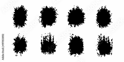 Collection of abstract black ink splatters and brushstroke shapes