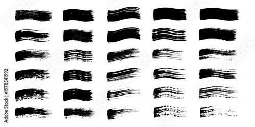 Collection of abstract black brush strokes arranged in a grid pattern